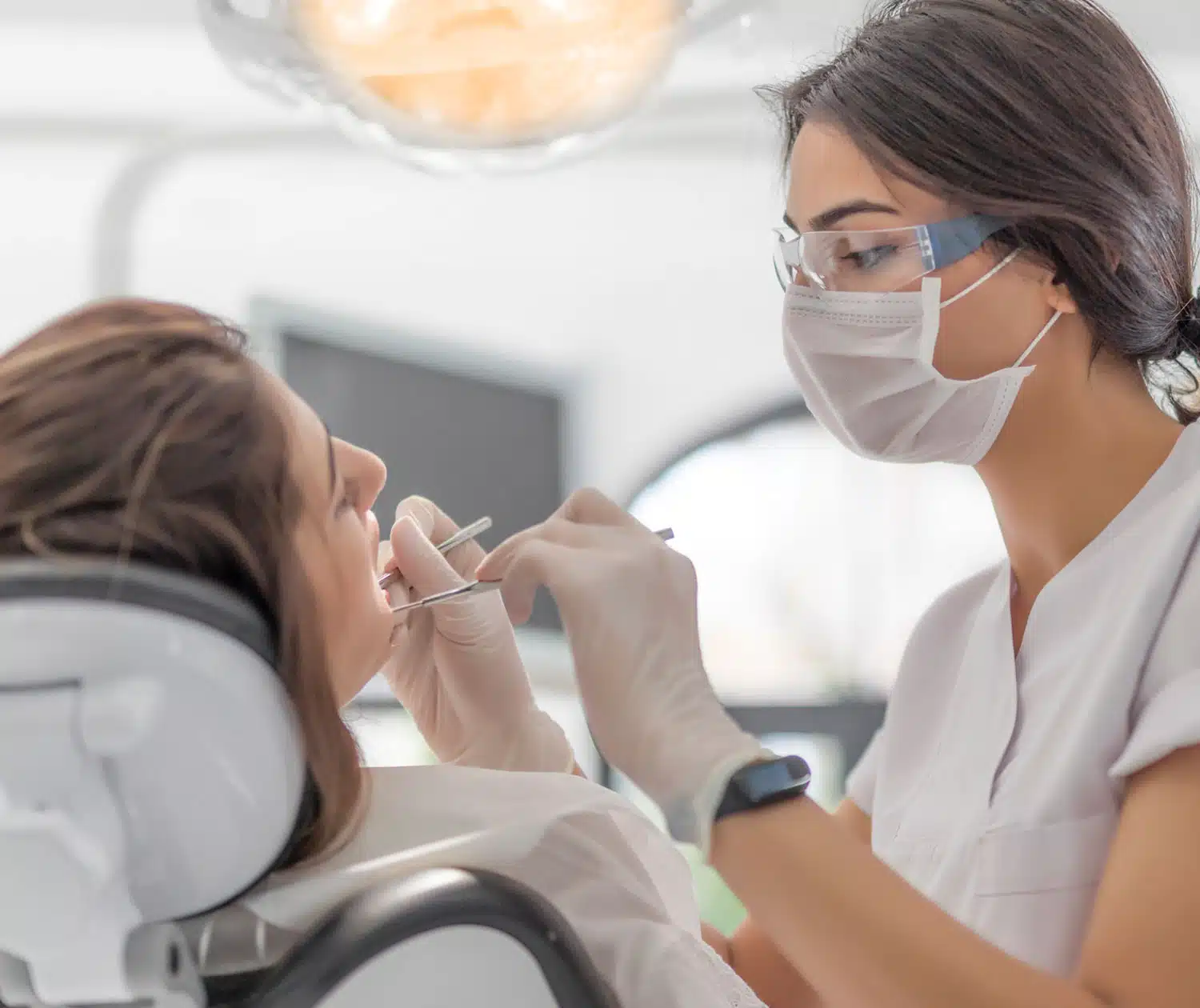 Dentist doing procedure in a patient