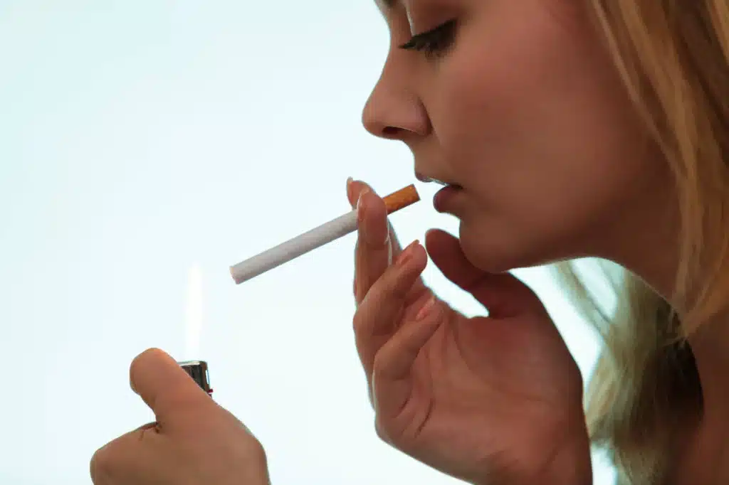 smoker-needing-Dental-Implants-in-Novi