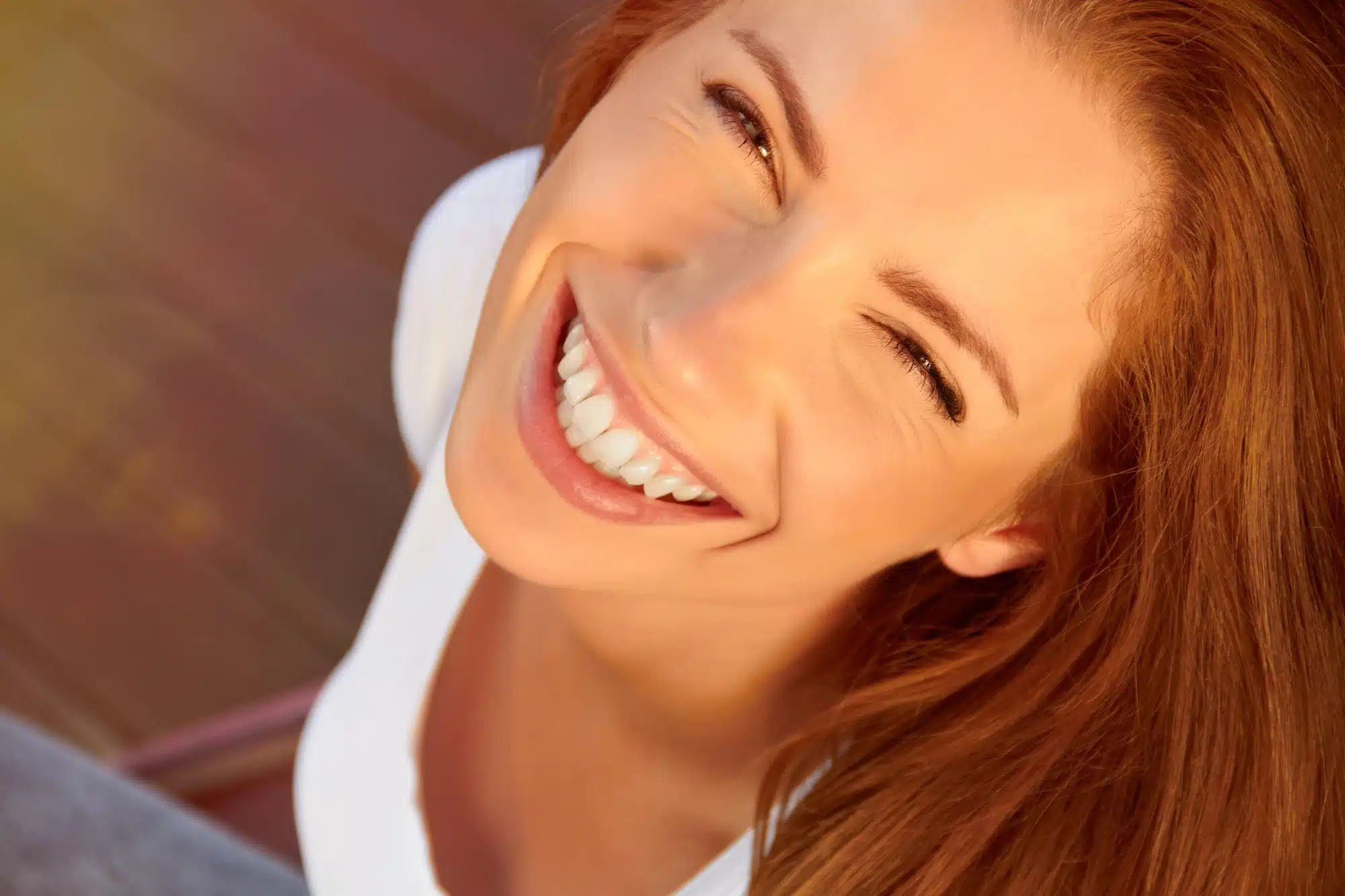 happy woman after going to the dentist near Meadowbrook Glens