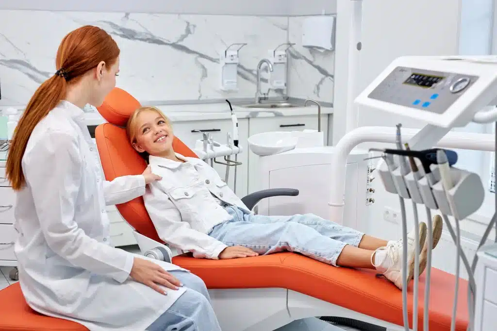 Novi family dentist with child