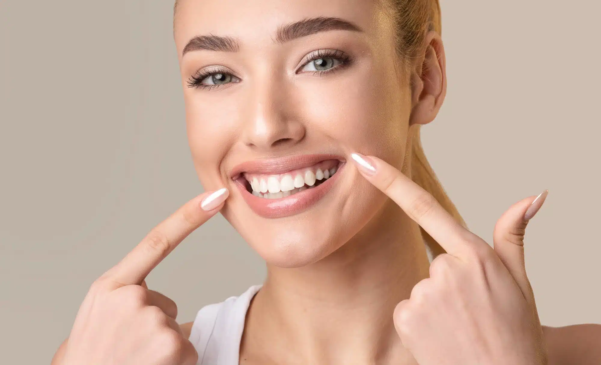 happy-woman-after-going-to-the-smile-makeover-dentist